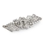 A 1940s diamond set double-clip broochof stylised scrolling design, set throughout with baguette cut