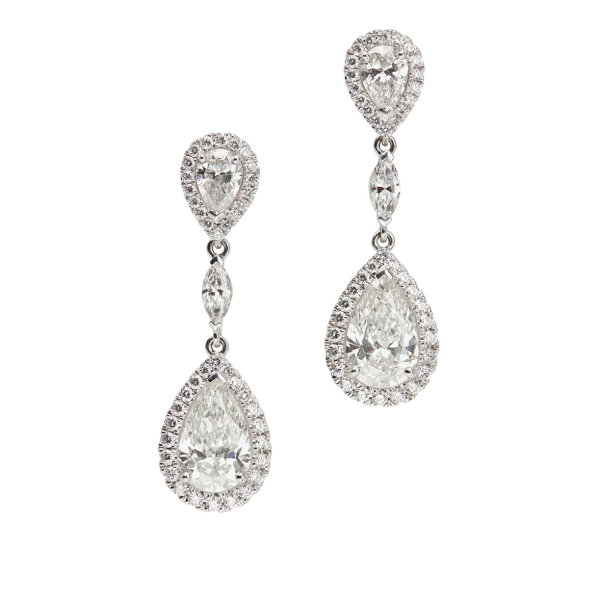 A pair of platinum and diamond set pendant earrings, De Beersfrom the Aura collection, each set with