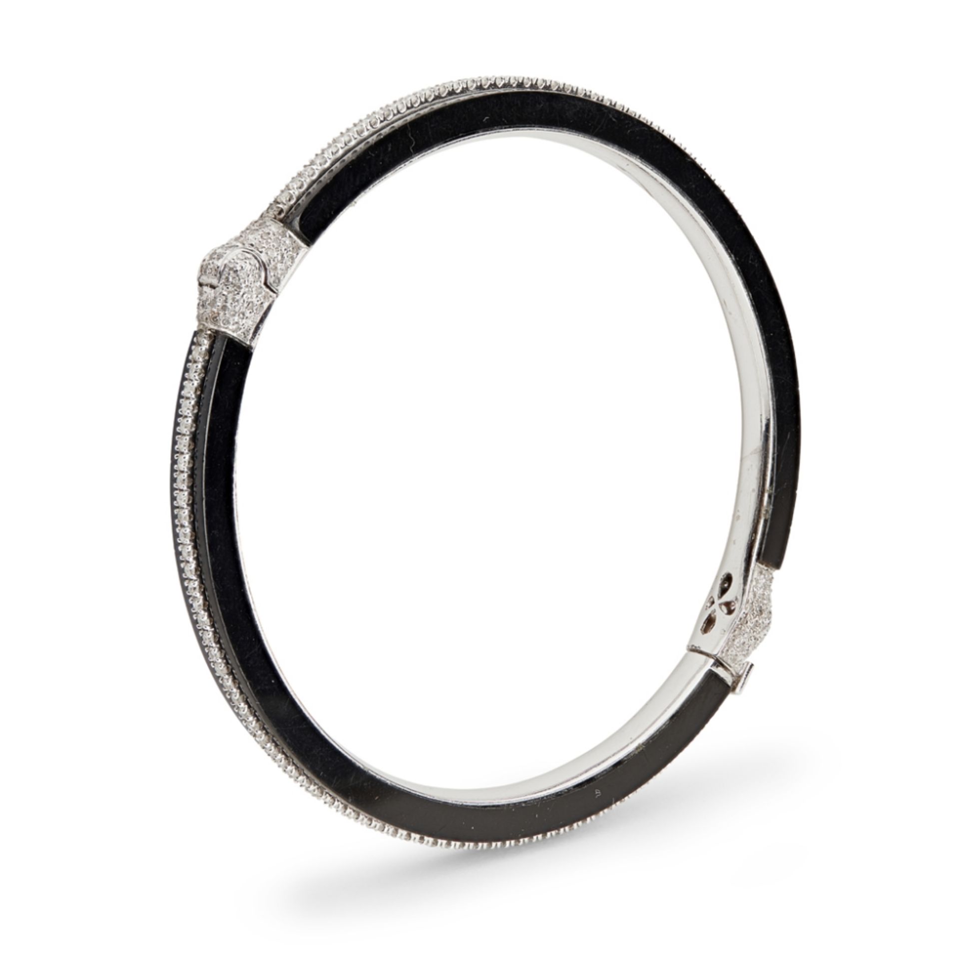 A pair of onyx and diamond set banglesboth of hinged design, set with a single row of small round - Image 3 of 3