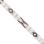 A 1920s Art Deco diamond and gem-set braceletcomposed of articulated links, set throughout with