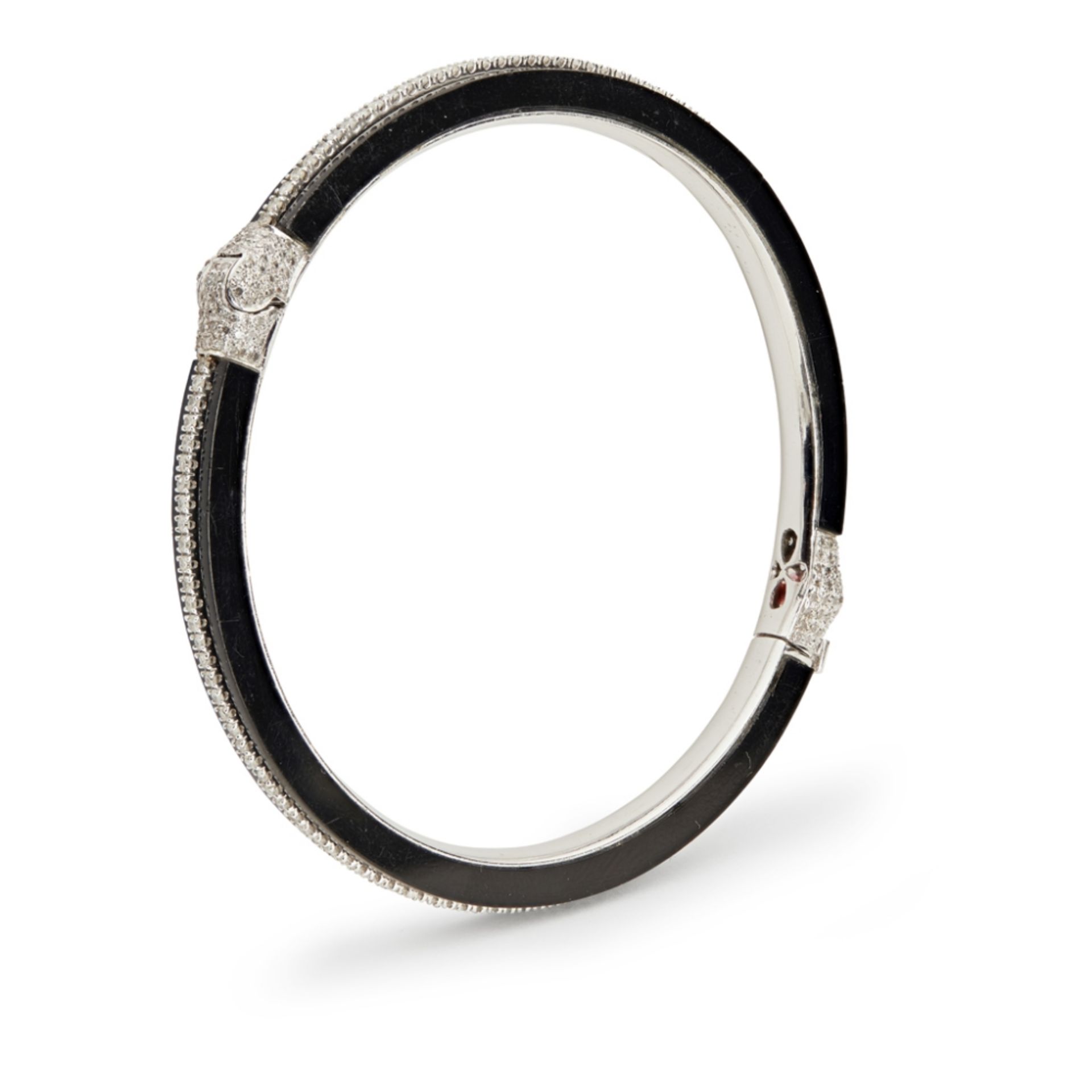 A pair of onyx and diamond set banglesboth of hinged design, set with a single row of small round - Image 2 of 3