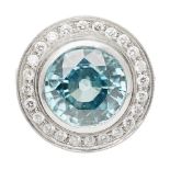 A zircon and diamond cluster ringcollet set with a round mixed cut blue zircon, in a single border