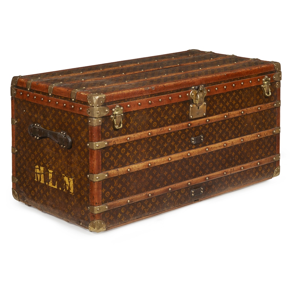 An early 20th century Louis Vuitton steamer trunk covered in LV monogram leather with brown