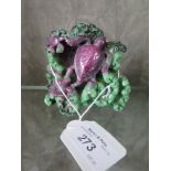 A green and purple figure group of three turtles 7.5cm high
