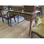 An Edwardian mahogany and satinwood crossbanded ladies writing desk, with leather top, three drawers