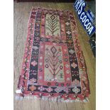 A Kilim rug of stylised floral design 155cm x 82cm and two other rugs (3)