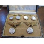 A set of dress studs, two brooches of owls and clocks