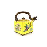 A Royal Worcester design Japanese square teapot, with salamander handle, yellow ground and raised