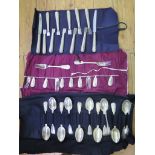 A large collection of thread and shell silver cutlery to include Twelve dinner knives - Five