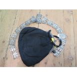 An Edwardian ladies handbag with silver mounts together with an EPNS ladies belt with