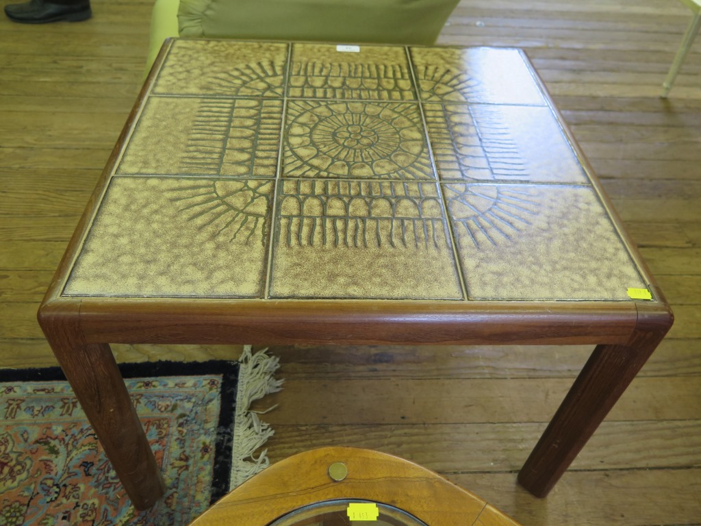 A vintage square coffee table G-Plan with tiled pattern top