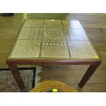 A vintage square coffee table G-Plan with tiled pattern top