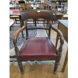 A William IV mahogany carver chair, with broad top rail and turned tapering legs