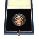 A boxed 1996 proof half sovereign