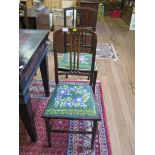 A set of three 1920s bedroom chairs with rail backs and tapering legs, and another bedroom chair (