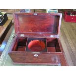 An early 19th century mahogany sarcophagus form tea caddy on pad feet, 31cm wide