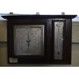A Shortland Brothers oak framed barometer and thermometer with square dial, 32cm x 22cm