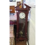 A Vienna style wall clock, modern, with enamel dial and twin train movement striking on a gong,