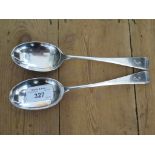 A pair of silver rat tail dessert spoons, maker R.B. Sheffield 1943