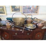 Four copper bottles, a brass jam pan, bedwarmer, saw, brass plaque and radio
