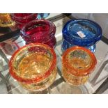 Two Whitefriars amber glass bubble effect ashtrays, 15cm and 10cm diameter, a blue glass ashtray and