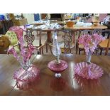 A Victorian cranberry glass Epergne, with four trumpet vases over a wavy bowl 48cm high, another