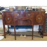 A reproduction mahogany bowfront sideboard, 137cm wide, and a matching serpentine serving table,