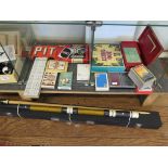 Various late 20th century playing cards and other card games, a snooker cue and a Towa microscope