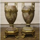 A pair of large gilt metal and marble garniture vases, of Regency style, the turned marble vases