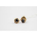 A pair of amethyst earrings set in 9 carat gold