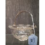 A French glass bon bon dish with Dutch silver swing handle