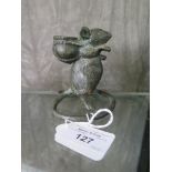 A 19th century bronze candle holder, in the form of a mouse carrying a container on its back, 8cm