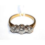A fine quality three stone diamond ring set in 18 carat gold