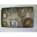 A collection of collectables to include seven photo frames, two silver napkin rings, a stone