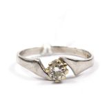 A single stone diamond ring set in 18 carat white gold