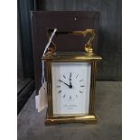 A brass carriage clock by William Widdop, single train movement 14cm high, in original box