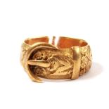 An 18 carat gold buckle ring
