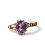 A diamond and amethyst cluster ring