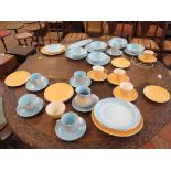 A Poole Pottery breakfast service in blue and yellow, 43 pieces