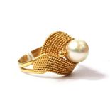 A high grade gold and pearl Persian ring, hallmarked