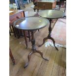 Two reproduction mahogany tripod tables, with reeded baluster supports, 38cm diameter