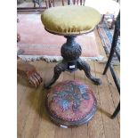 A Victorian rosewood and beadwork footstool with foliate fruit design, on pad feet 32cm diameter,