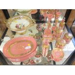 A Victorian pink glass dressing table set with gilt decoration, and a Victorian pedestal dish,