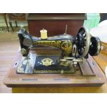 An Edwardian Frister and Rossmann table top sewing machine