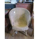 A Lloyd Loom shell shaped occasional chair