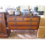 A mahogany and satinwood dressing table base, with two short and two long drawers on turned legs and