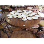 A William IV mahogany snaptop breakfast table, the circular top on an octagonal stem and