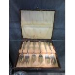 A cased set of six E.P. cake forks