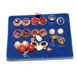 Eleven pairs of gem set earrings