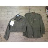 A British Army Captain's blouse, a Captain's jacket for the Royal Corps of Signals, and a leather